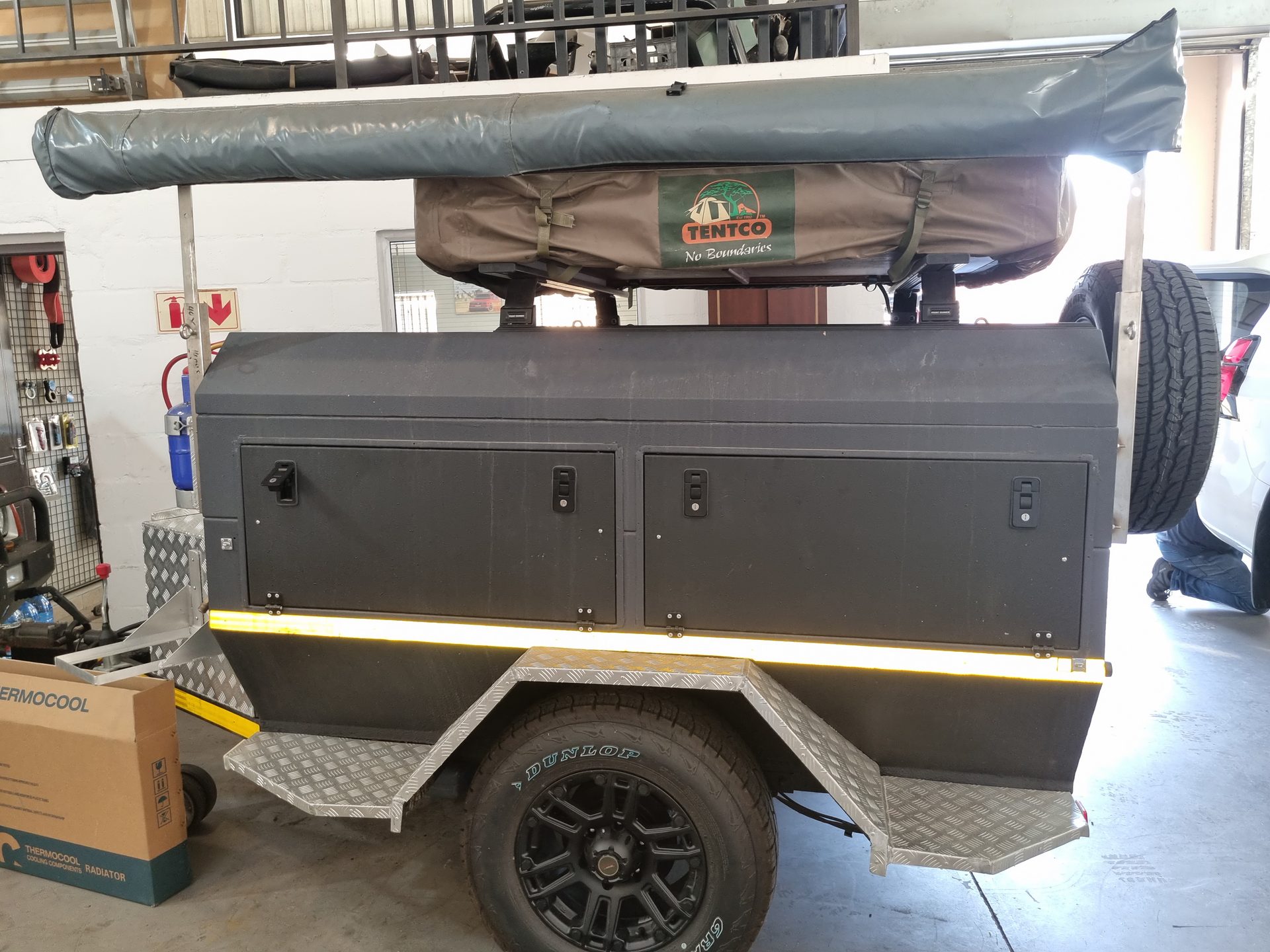 Before — rear door and storage as it came