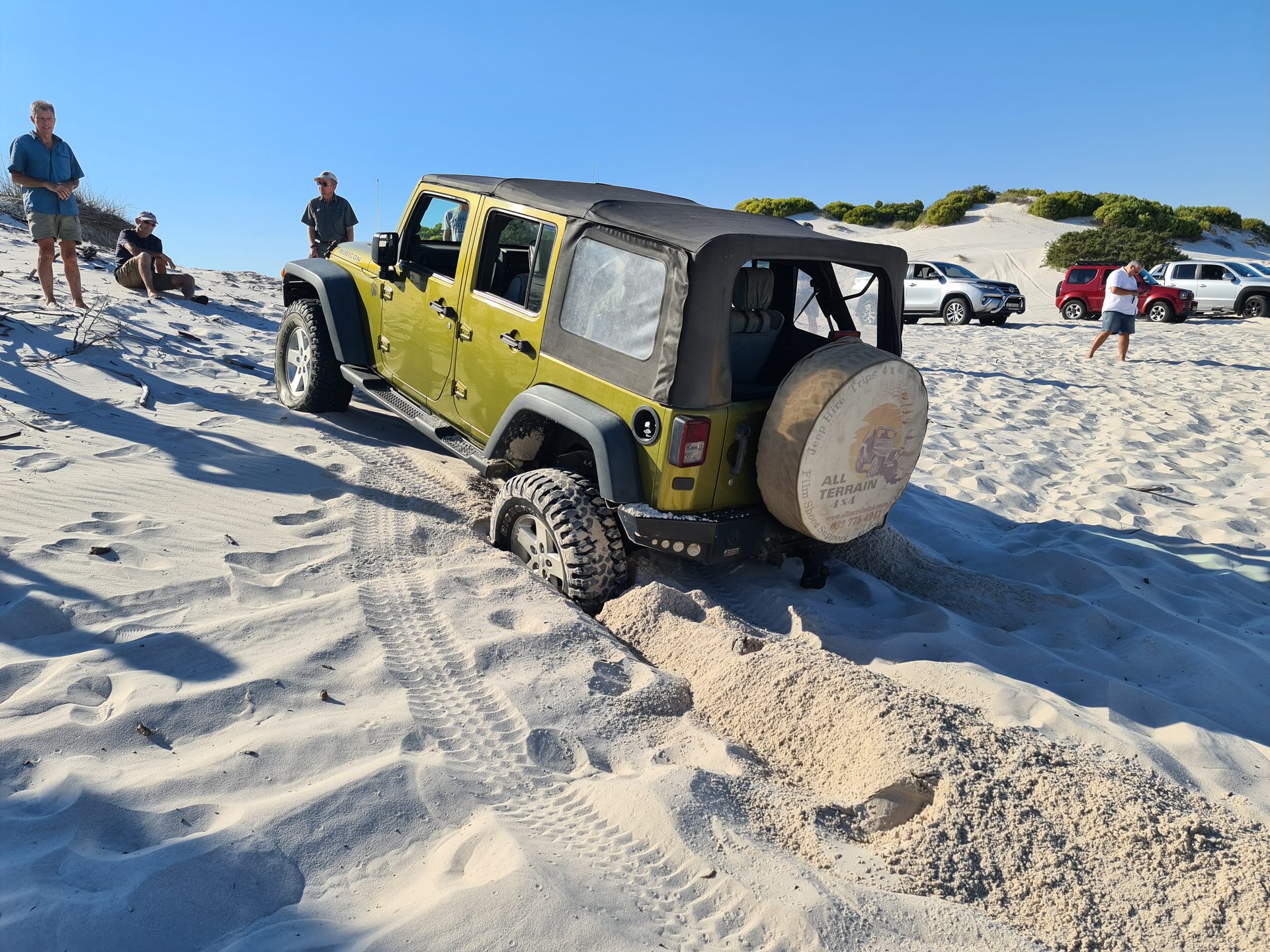 Vehicles working through the dune field at Atlantis