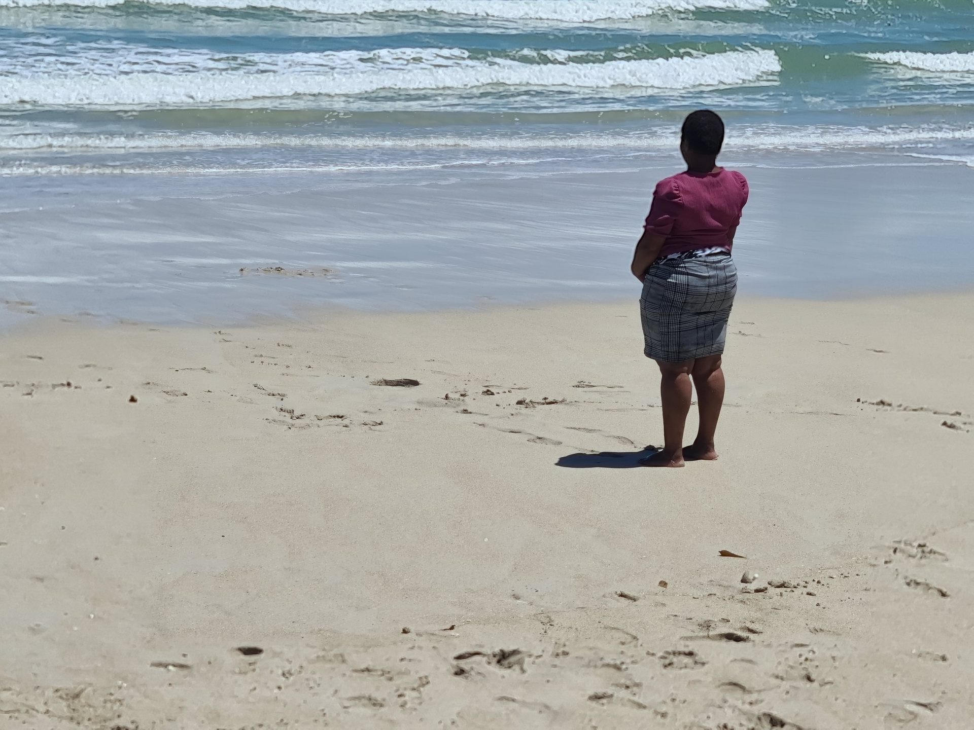 Looking back along the beach from our spot