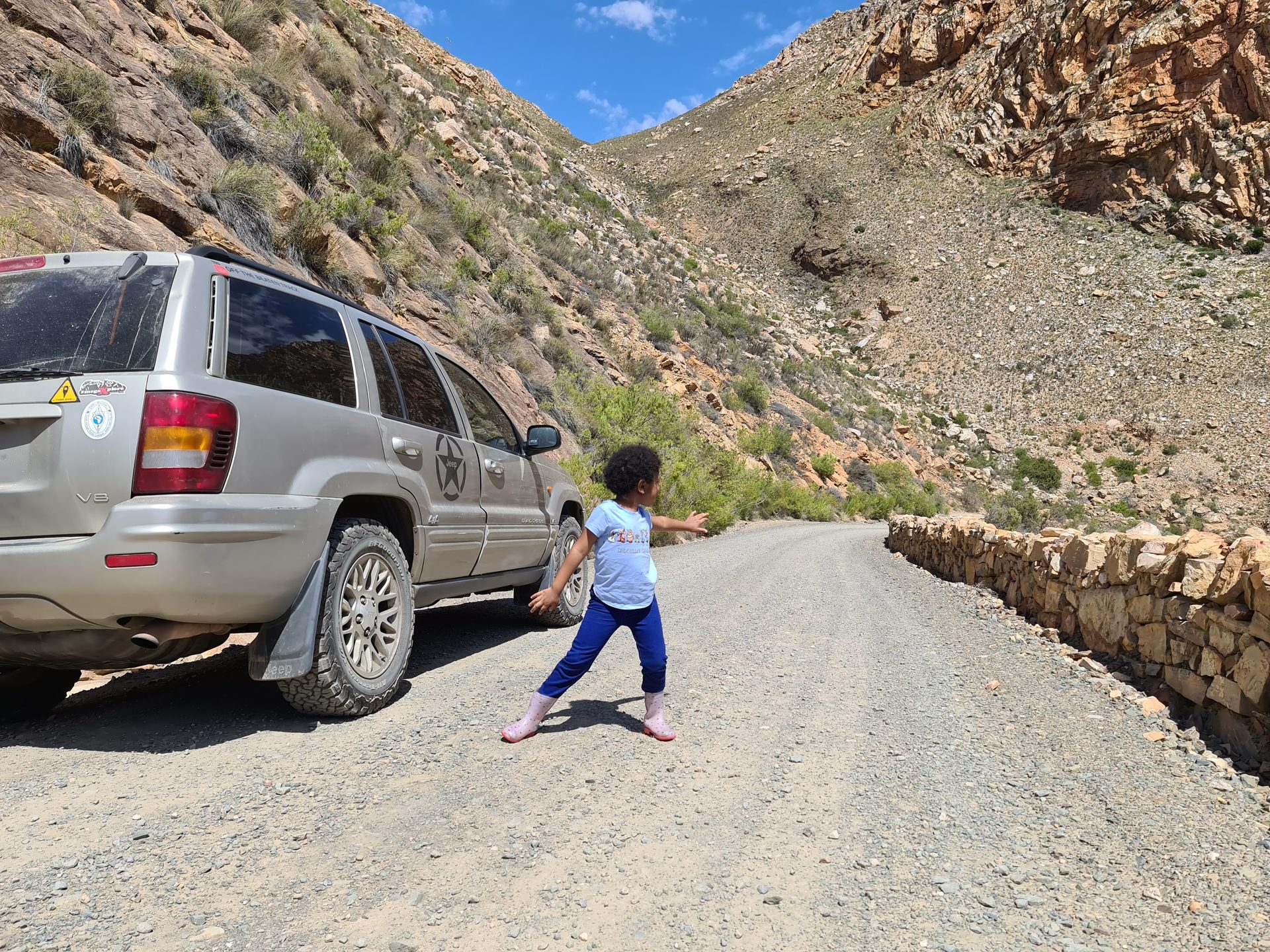 The Jeep working through the gorge — the canyon walls run straight up on both sides