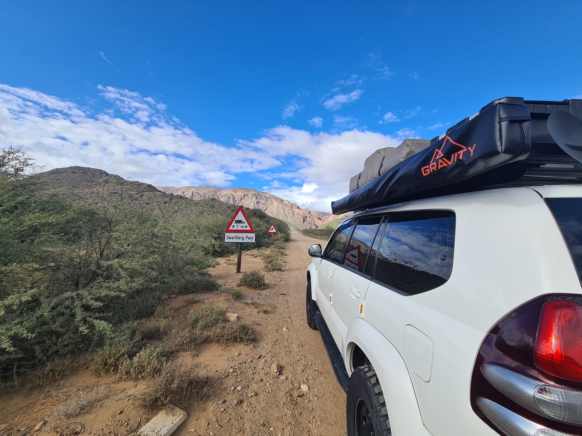 The gravel road winding deeper into the Swartberg