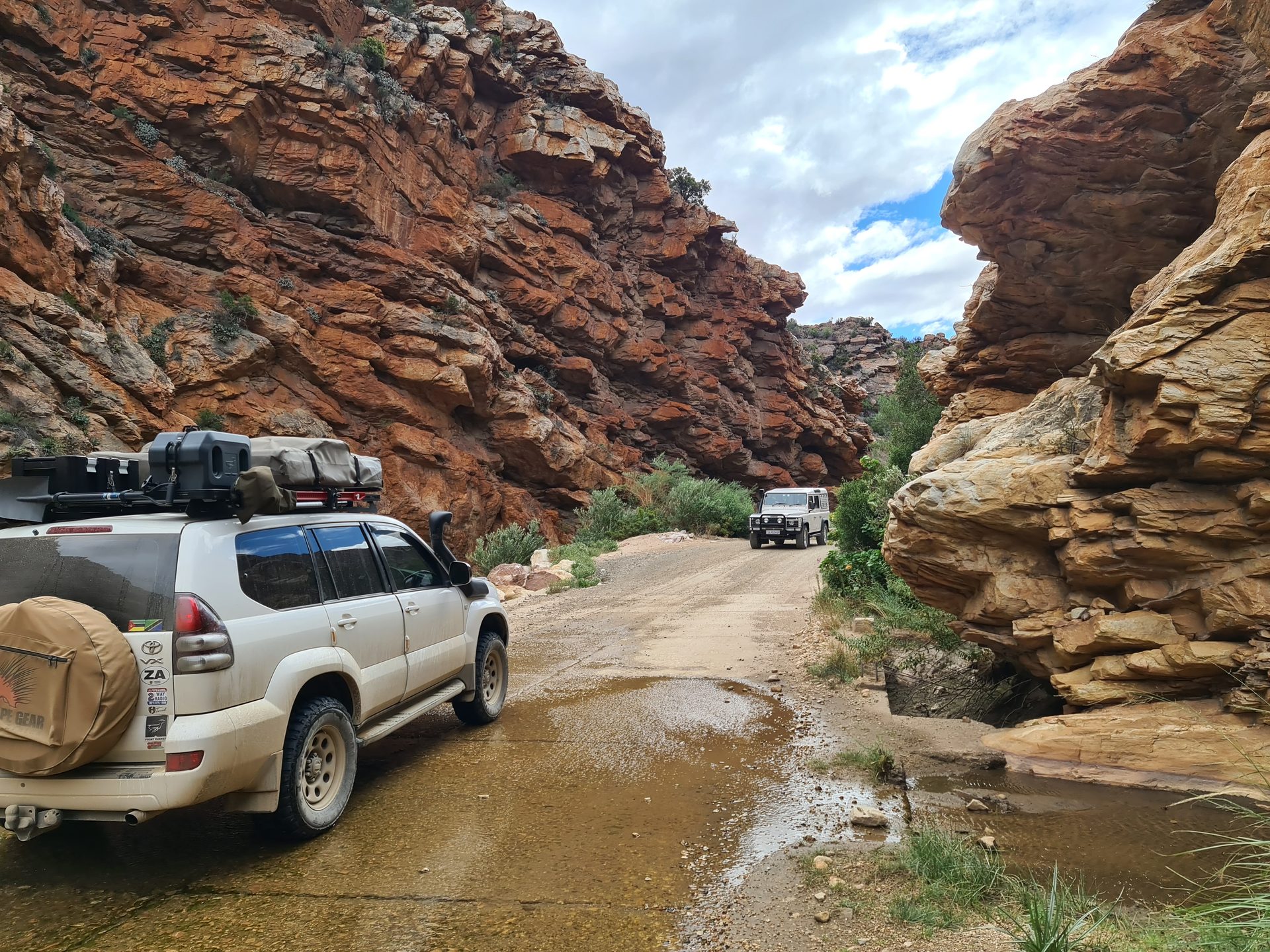 The road threading through the mountains on the return run
