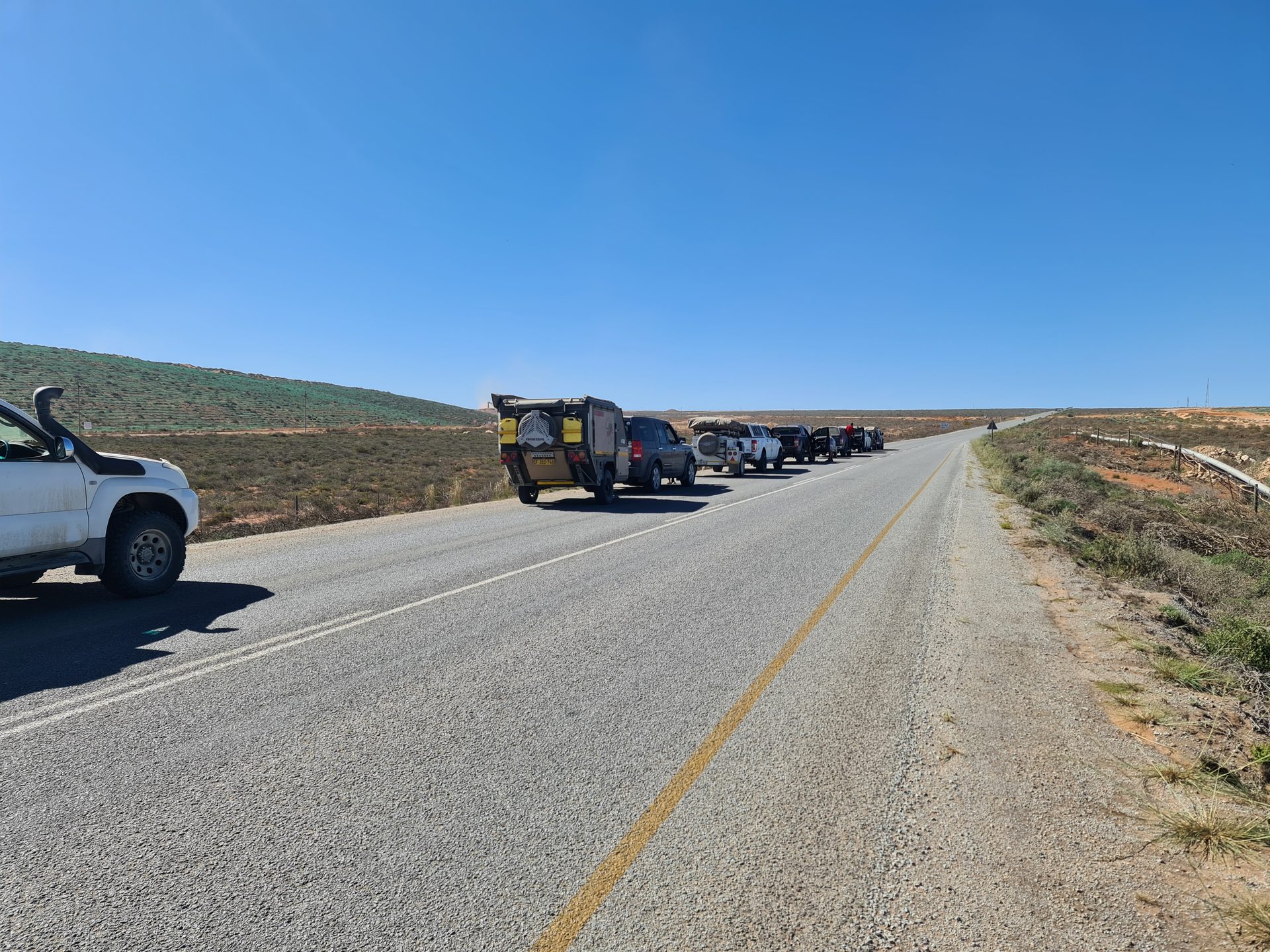 The convoy regrouped on the road home from the coast