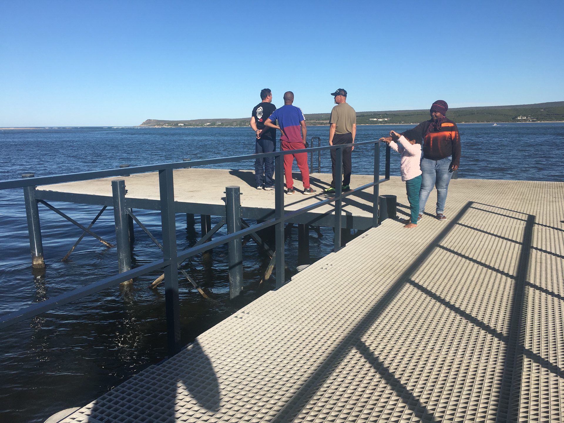 The group on the Witsand jetty between the rain