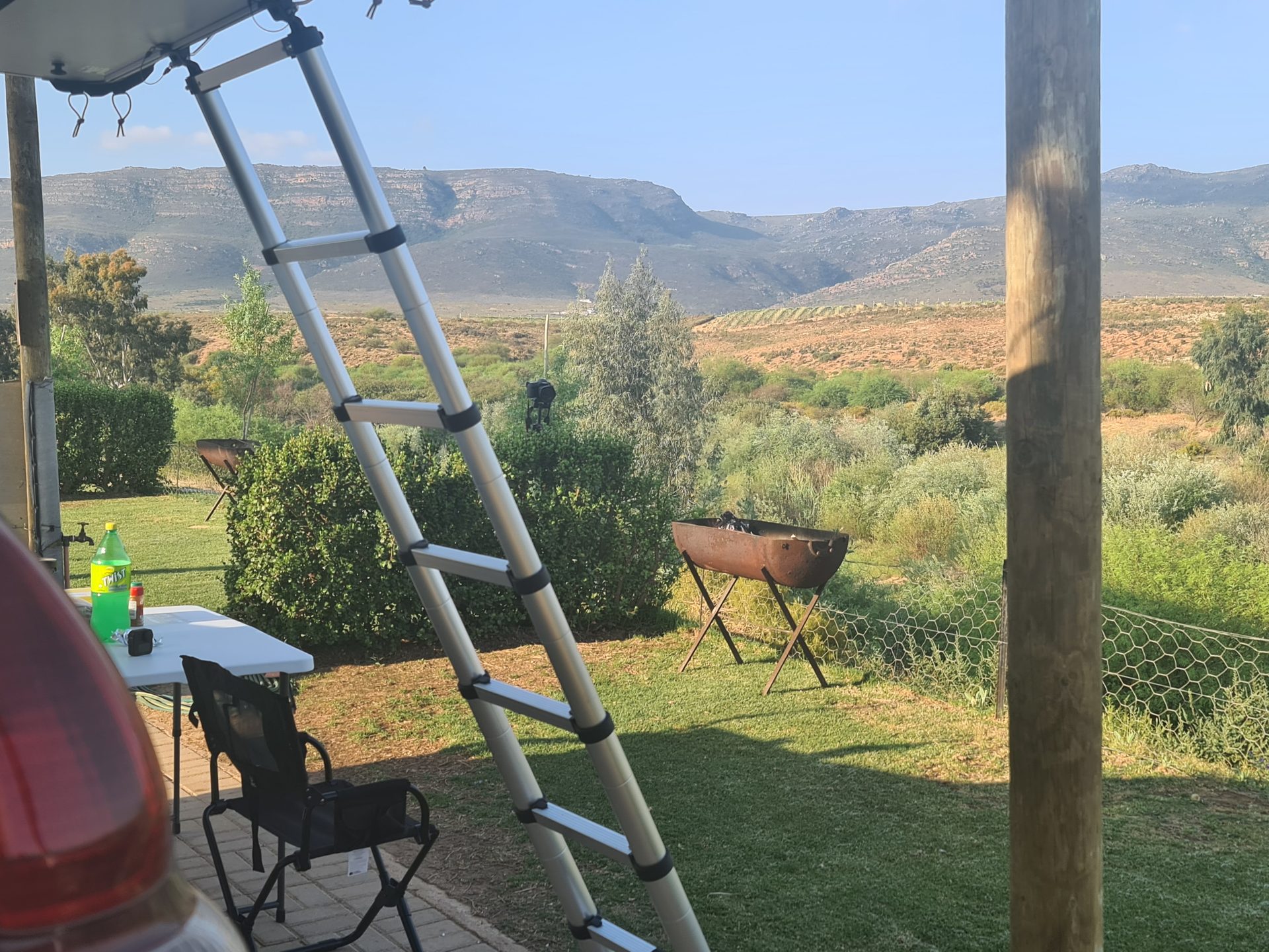 Evening at camp with the mountains beyond